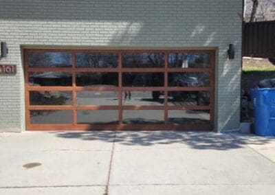Close up of windowed glass garage doors