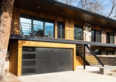 Modern wooden home with black trim