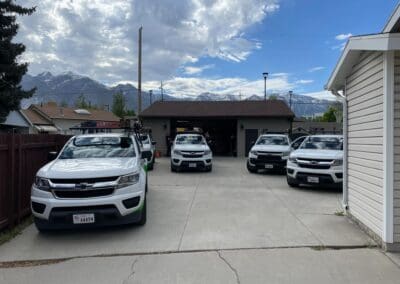Fleet of AAA Garage Door pick up trucks