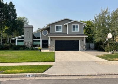 Modern home with black garage door