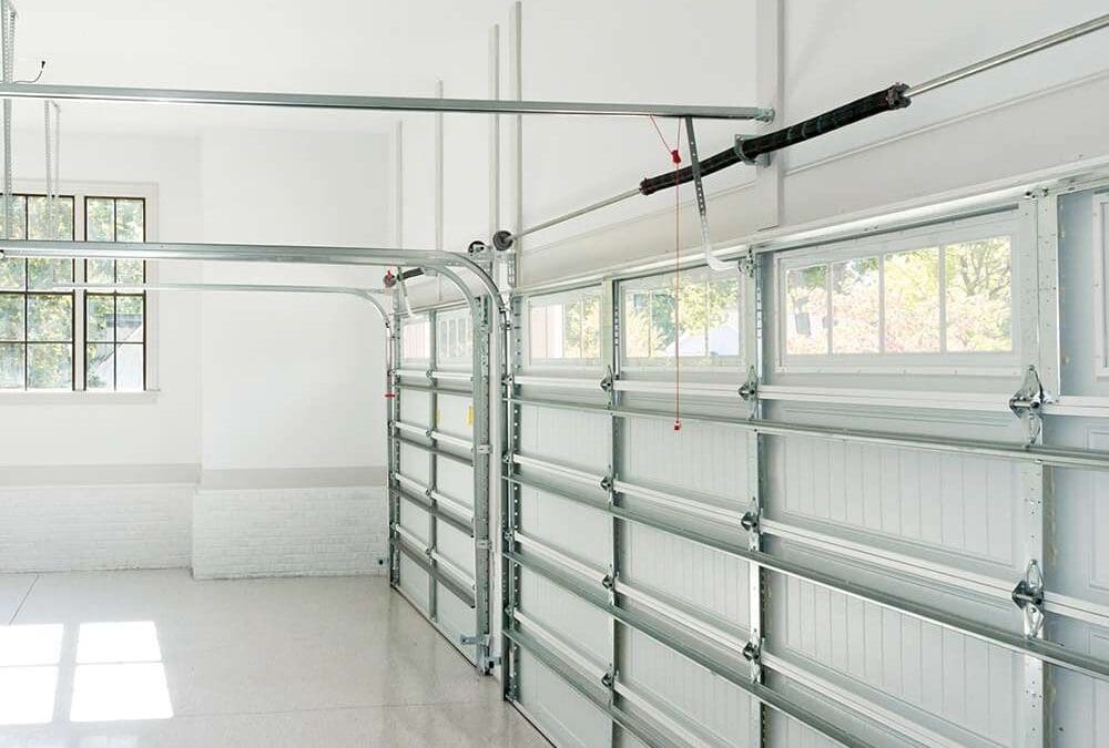 Is Your Garage Door Acting Strange? It Might Be a Broken Spring (And Why You Shouldn’t Ignore It)