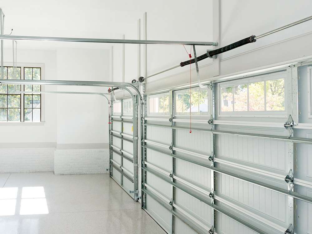 a garage door opener attached to a ceiling