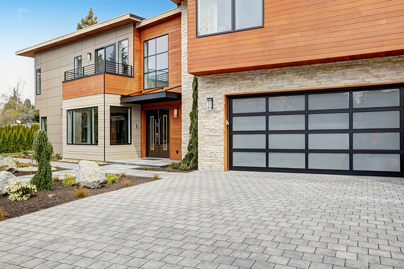Glass Panel garage Door on a modern home